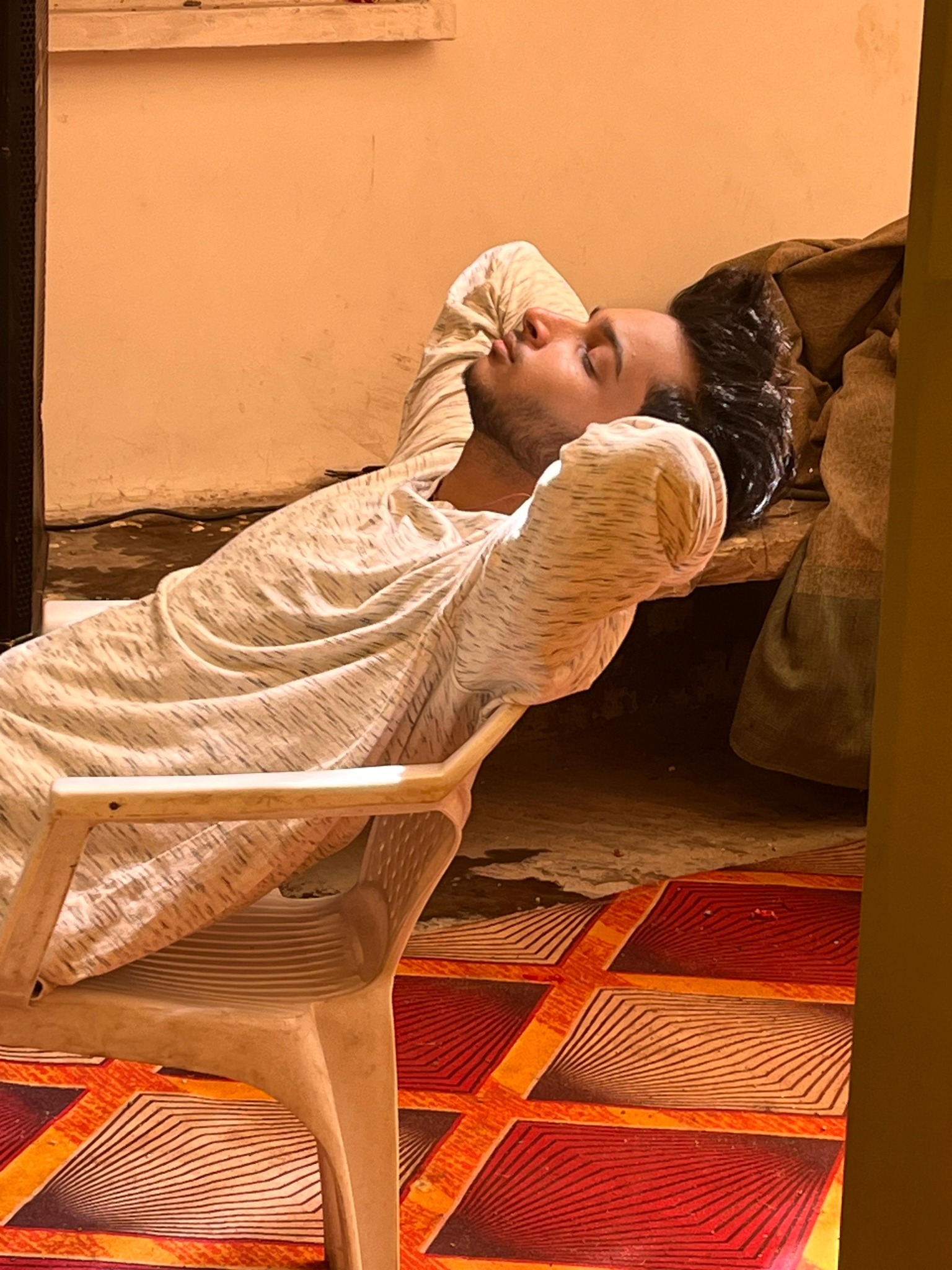 A relaxed moment reclining in a chair